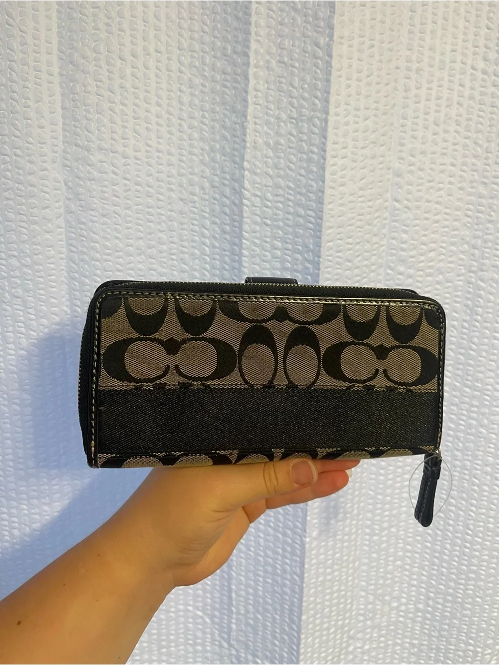 48. Coach wallet.